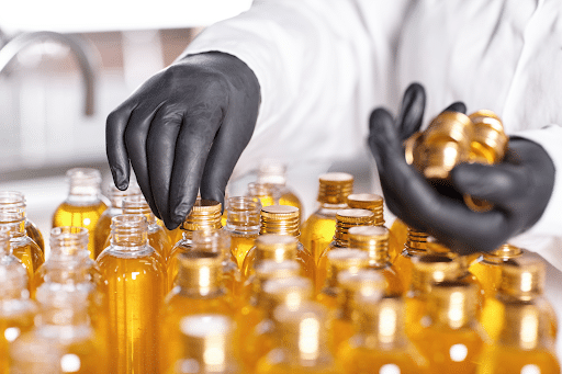 OEM perfume manufacturer in Malaysia blending Arabian fragrance oils for custom perfume production