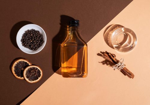 Natural oud wood, amber, and musk ingredients used in Arabian fragrance production in Malaysia